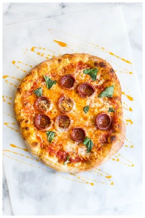 Hot Honey Pepperoni pizza from SLYCE Pizza Cafe in Azizi Riviera